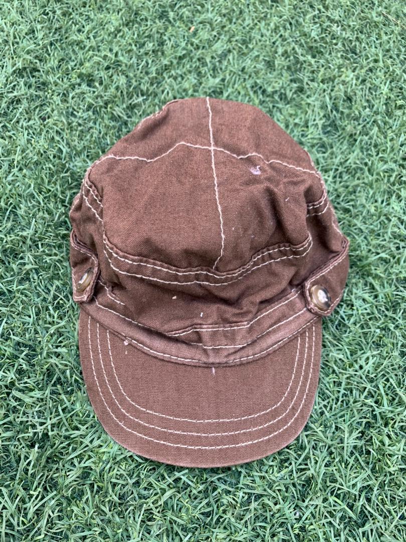 Brown face cap size 7years